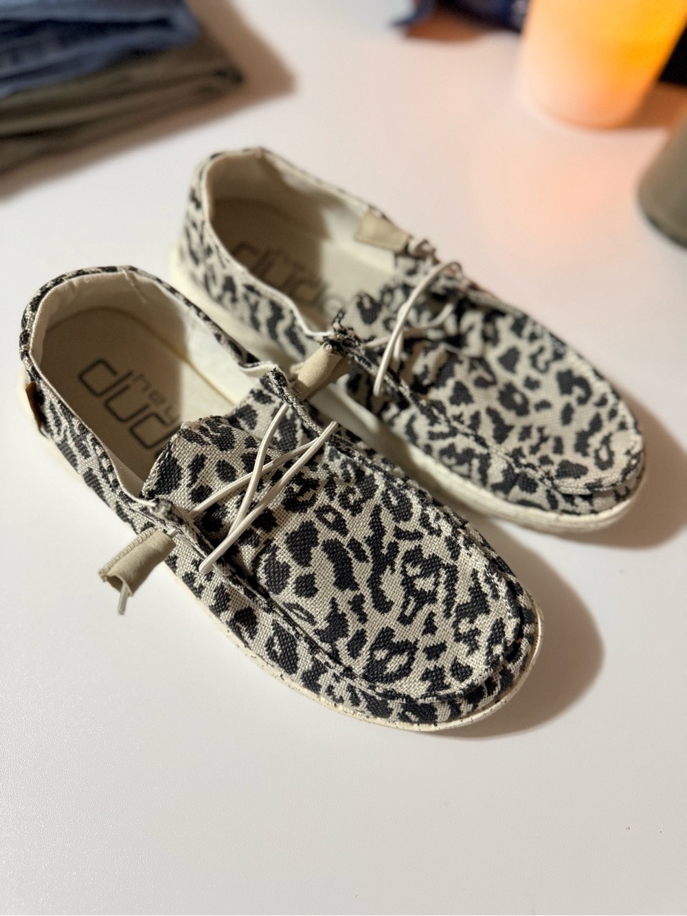 Hey Dude women’s Leopard Print Slip-Ons in Black and Cream